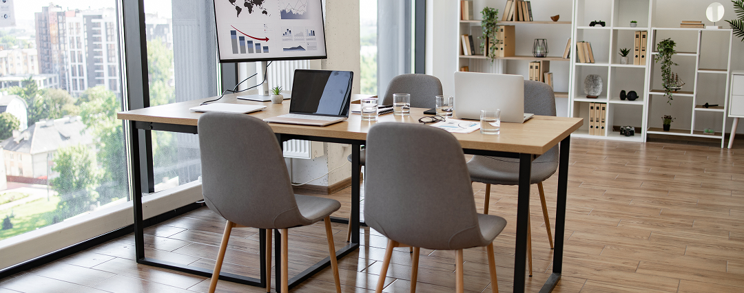 Modern office space with desk and laptop